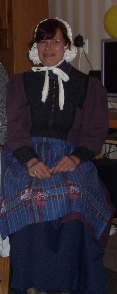 Sarah jurk met knipmuts foto